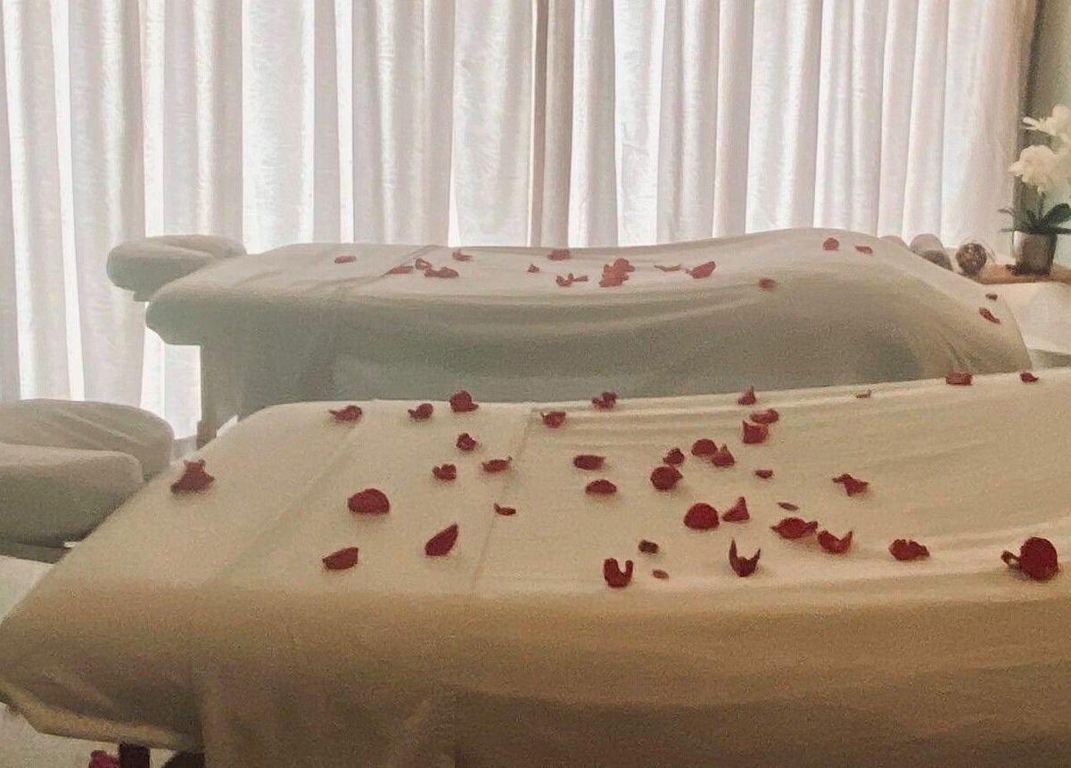 Relaxing massage tables with rose petals at REFLECTIONS SPA BARBADOS in Bridgetown, Christ Church, BB.