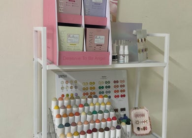 Colorful nail polish display at Twinkle Nail Studio, Cheras, Selangor, MY showcasing vibrant options.