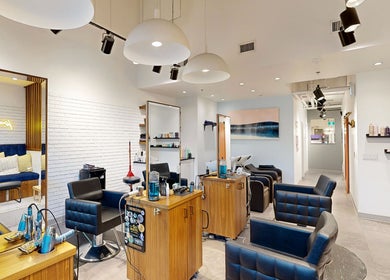 Modern salon interior with stylish seating at The Loft, Canmore, Alberta, CA.