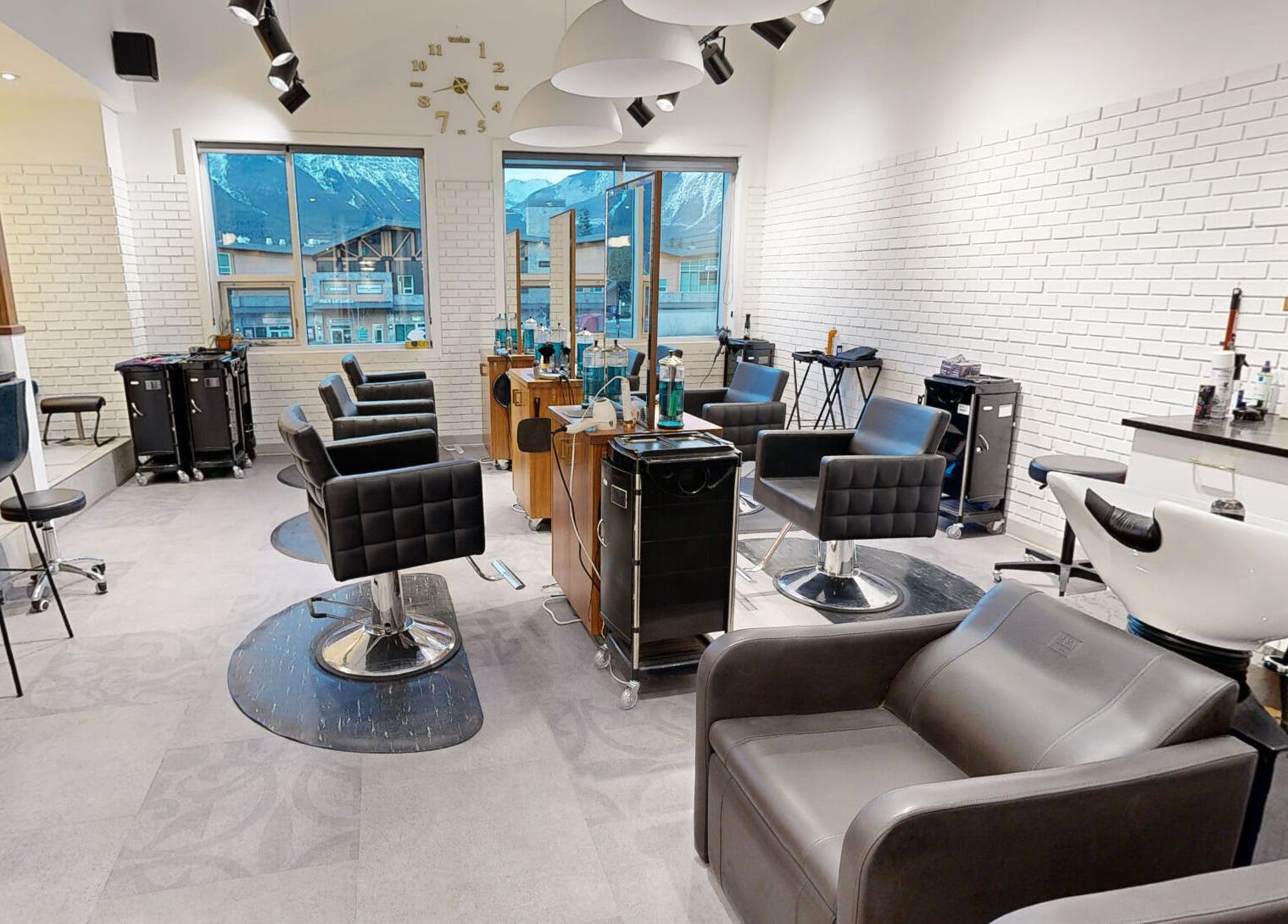 Modern salon interior at The Loft, Canmore, Alberta, CA with stylish chairs and decor.