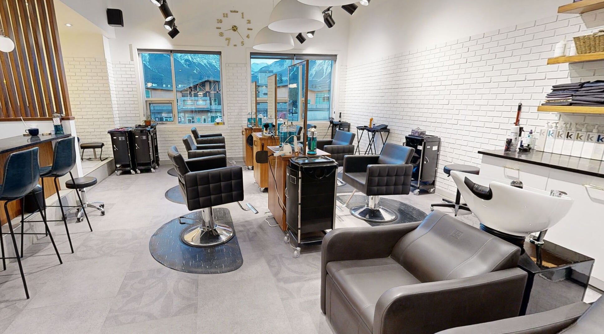 Modern salon interior at The Loft, Canmore, Alberta, CA with stylish chairs and decor.