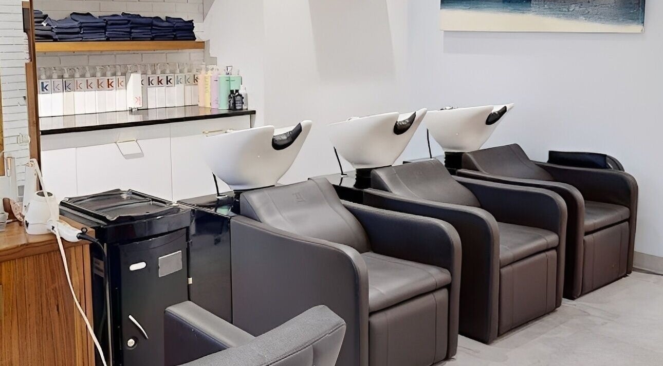 Elegant hair wash stations at The Loft, Canmore, Alberta, CA, offering a serene salon experience.