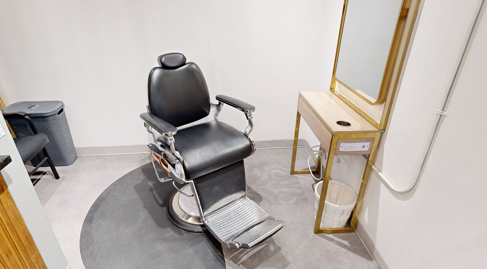 Modern styling chair at The Loft, Canmore, Alberta, CA offering luxurious hair services.