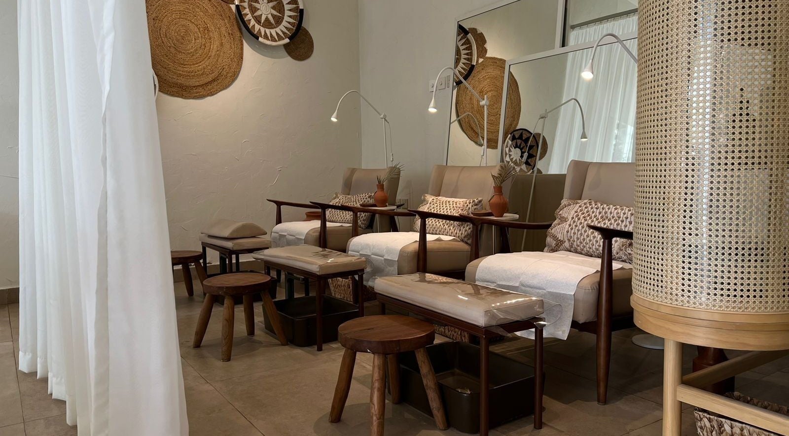 Elegant pedicure station at Be.salon, Riyadh, Riyadh Province, SA featuring plush seating and soft lighting.