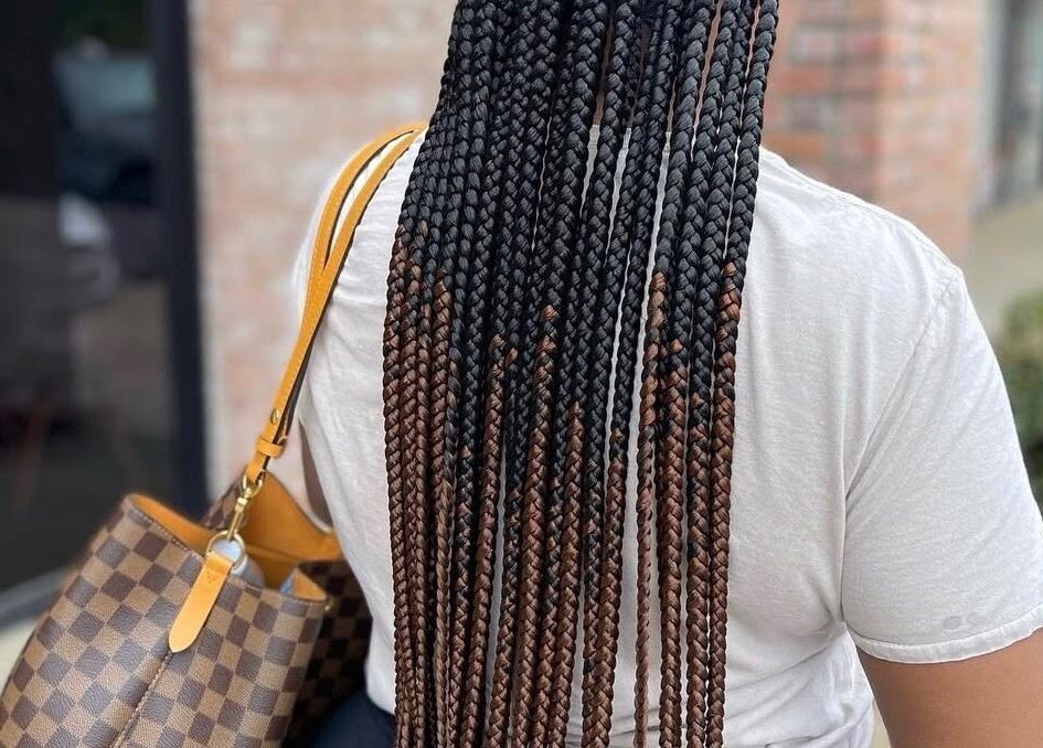 Stylish braids at The Braids Lab, Tilbury, England, GB, showcasing expert hairstyling.