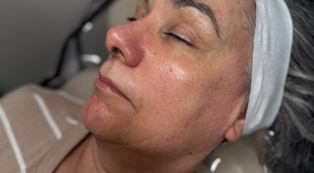 Facial treatment at themaedclub in Swallownest, England, GB highlighting a peaceful, refreshed complexion.