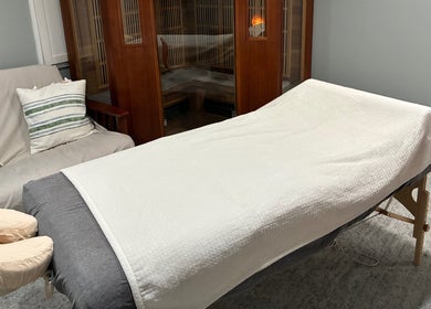 Relaxing massage table at It Is Well in Burlington, Wisconsin, US, offering tranquility and comfort.