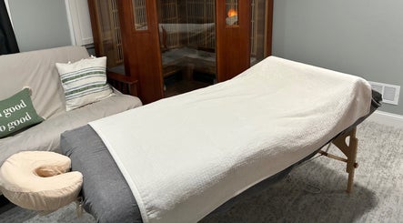 Relaxing massage table at It Is Well in Burlington, Wisconsin, US, offering tranquility and comfort.