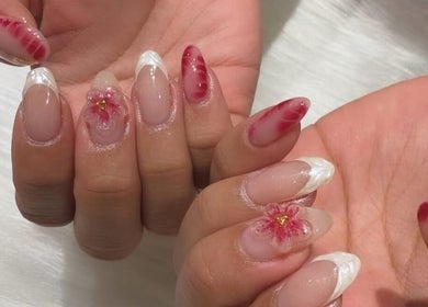 Beautiful floral nail art at Divine Nails Studio, WA, Western Australia, AU, showcasing intricate red designs.