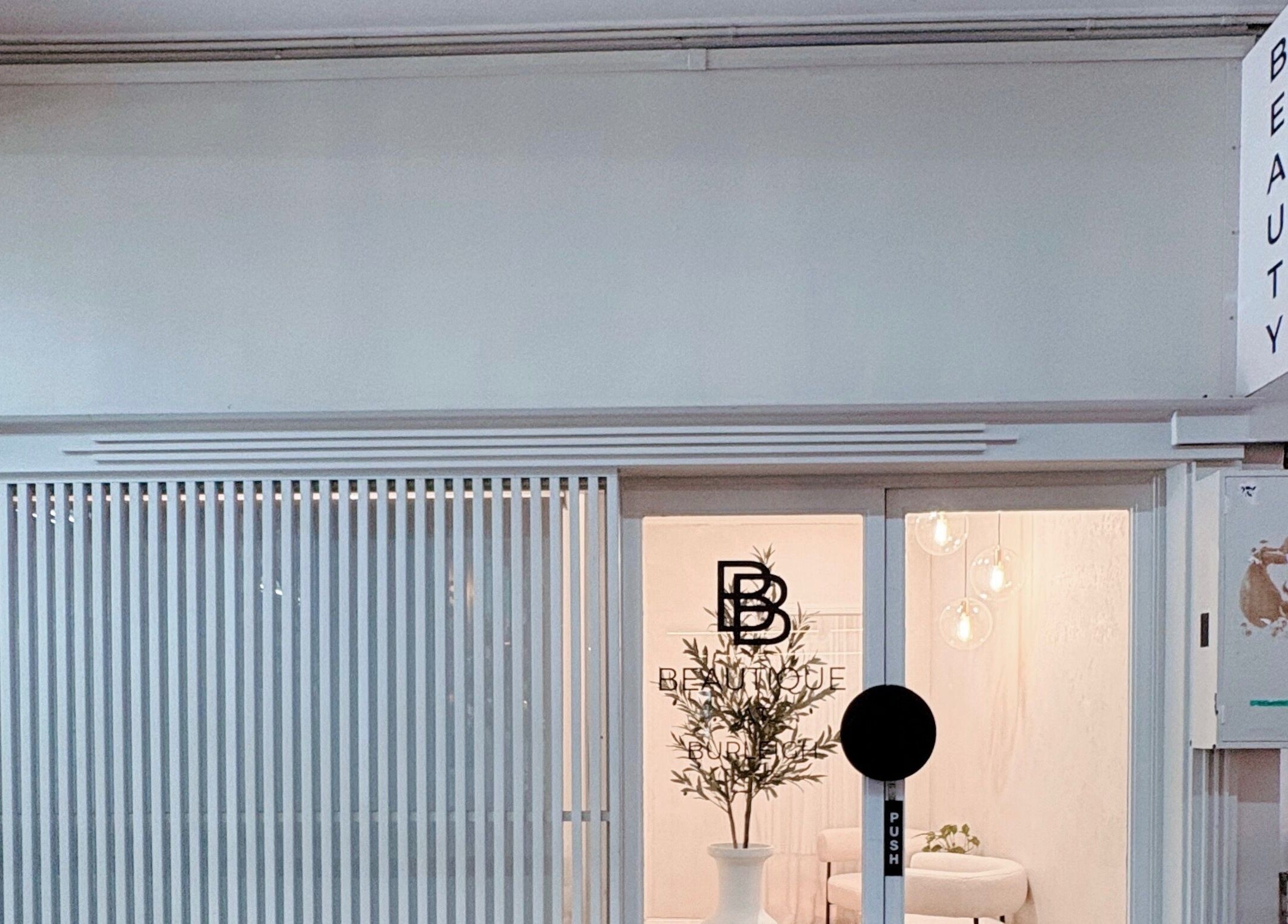 Lashié entrance showcasing chic interior, Burleigh Heads, Queensland, AU beauty salon.