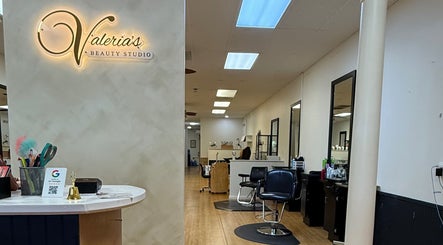 Inside Valeria’s Beauty Studio in Kennesaw, Georgia, showcasing stylish salon chairs and decor.