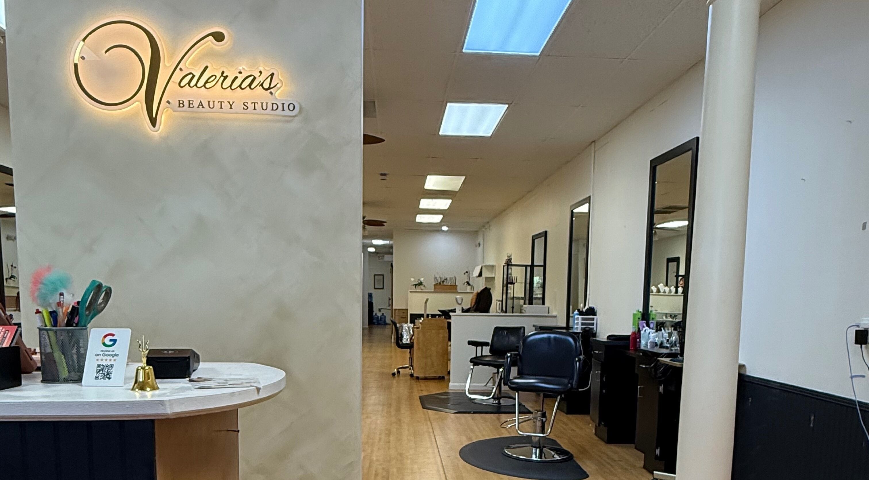 Inside Valeria’s Beauty Studio in Kennesaw, Georgia, showcasing stylish salon chairs and decor.