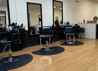 Modern salon chairs and mirrors at Valeria’s Beauty Studio, Kennesaw, Georgia, US.