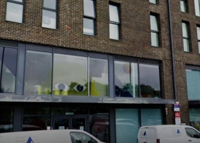 Exterior view of Hijama East London wellness center in a modern brick building, London, England, GB.