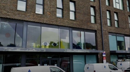 Exterior view of Hijama East London wellness center in a modern brick building, London, England, GB.