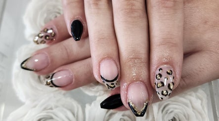 Elegant leopard print nails at L'amitié, Flemington, New Jersey, US. Perfectly crafted nail designs.