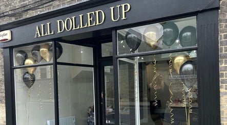 Elegant salon facade of J c hairstylist with balloons, located in Stowmarket, England, GB.