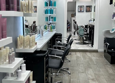 Luxurious interior of The Royal Salon in London, England, GB with high-end beauty products on display.