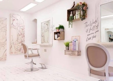 Chic interior of Hair by Janine at Shelley Lane Salon, Aberkenfig, Wales, GB with stylish decor and salon chairs.