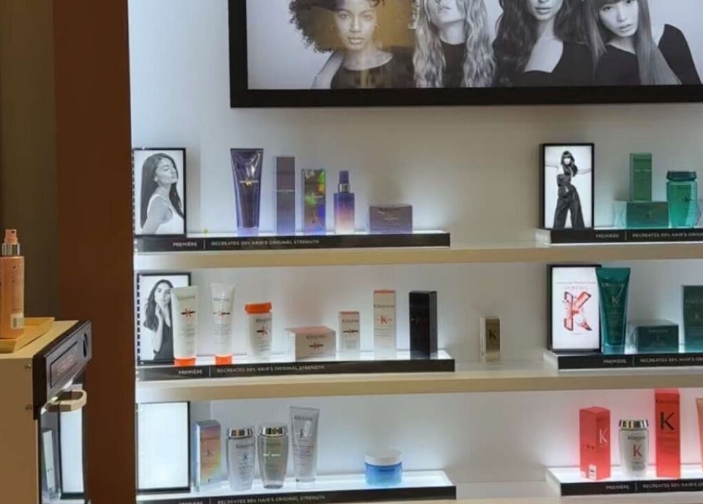 Kerastase products on lit shelves at Areej Beauty Spa, Seeb, Muscat Governorate, OM.
