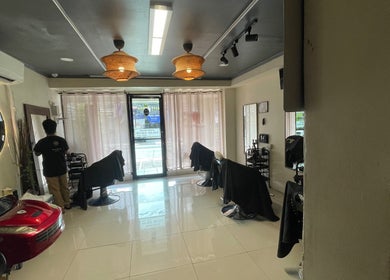 Interior of Fade’N Cut Barber Shop in Paranaque City, Metro Manila, PH, featuring stylish chairs and decor.