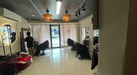 Interior of Fade’N Cut Barber Shop in Paranaque City, Metro Manila, PH, featuring stylish chairs and decor.