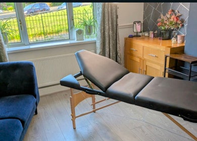 Relaxing spa room at Stoke Brow Enchantment, Stoke-on-Trent, England, GB, featuring a treatment bed and cozy decor.