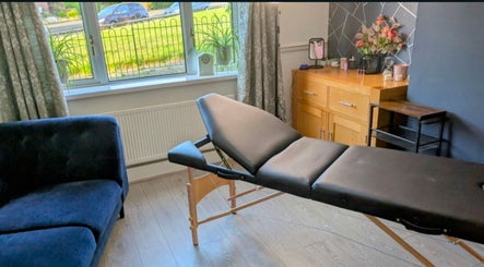 Relaxing spa room at Stoke Brow Enchantment, Stoke-on-Trent, England, GB, featuring a treatment bed and cozy decor.