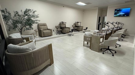 Experience luxury at Amitie Beaute Bar in Los Angeles, California, US. Relaxing spa chairs and decor beckon.