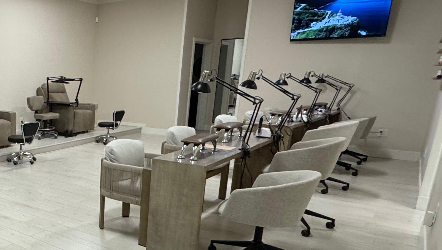 Elegant interior of Amitie Beaute Bar, a salon in Los Angeles, California, US, featuring cozy nail stations.