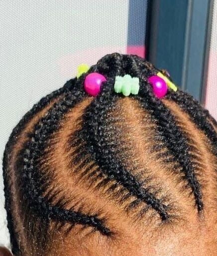 Stylish braided hairstyle with colorful beads at Prettykidshairdo, Pretoria, Gauteng, ZA.