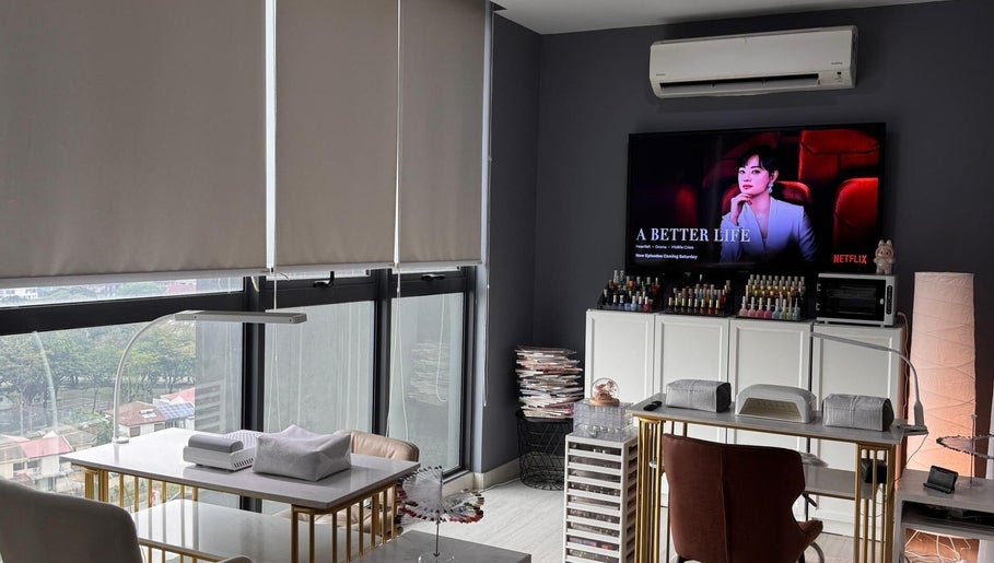 Modern interior of BEEQNAILS & LASH STUDIO in Petaling Jaya, Selangor featuring a nail station and stylish decor.