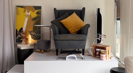 Elegant relaxation corner at BEEQNAILS & LASH STUDIO in Petaling Jaya, Selangor, MY with modern decor.