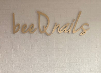 BEEQNAILS & LASH STUDIO sign in Petaling Jaya, Selangor, MY, on a textured brick wall.