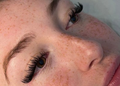 Close-up of expertly applied eyelash extensions at Nicki Does Beauty, Bristol, England, GB.