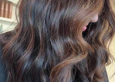 Glossy brunette waves styled at Hair by Neomai - SOUTH MELBOURNE, Melbourne, Victoria, AU salon.