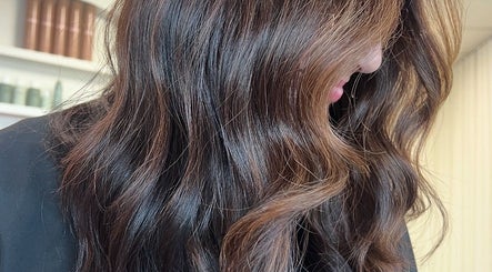 Glossy brunette waves styled at Hair by Neomai - SOUTH MELBOURNE, Melbourne, Victoria, AU salon.