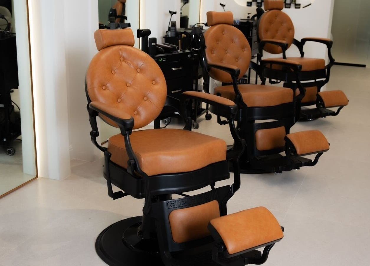 Luxurious barber chairs at Fadetown, Riyadh, Riyadh Province, SA, showcasing premium comfort and style.