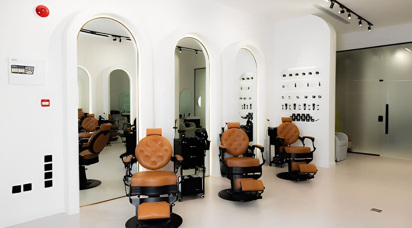Modern beauty salon at Fadetown, Riyadh, Riyadh Province, SA with sleek chairs and mirrors.