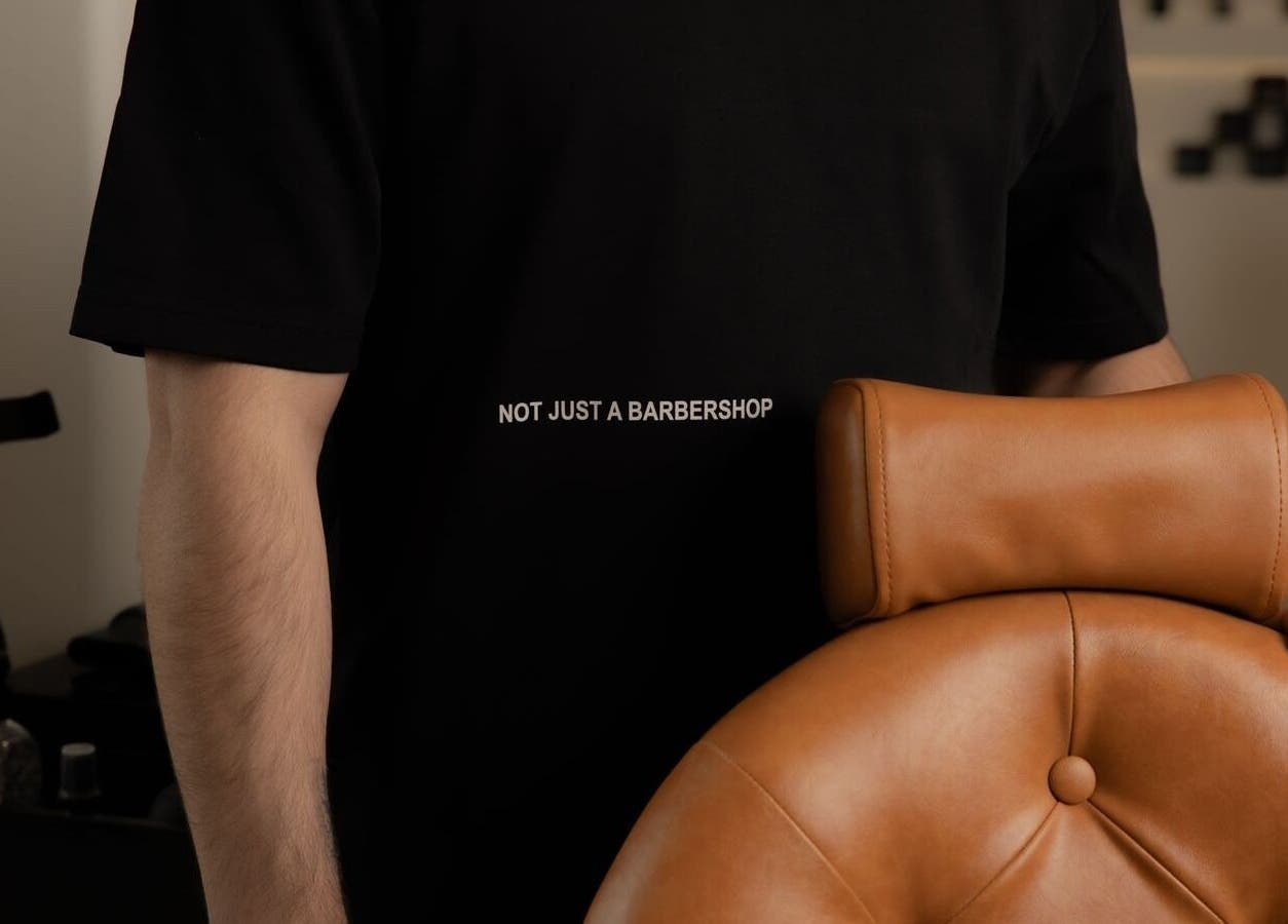 Stylish barber chair at Fadetown, Riyadh, Riyadh Province, SA, showcasing modern grooming ambiance.