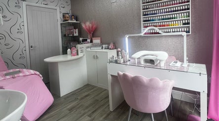 Chic interior of Beauty By Amanda in Fforest-fach, Wales, GB showcasing nail polish display and beauty stations.