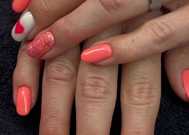 Colorful nail art with hearts at Beauty Authentic Oasis, Pretoria, Gauteng, ZA.
