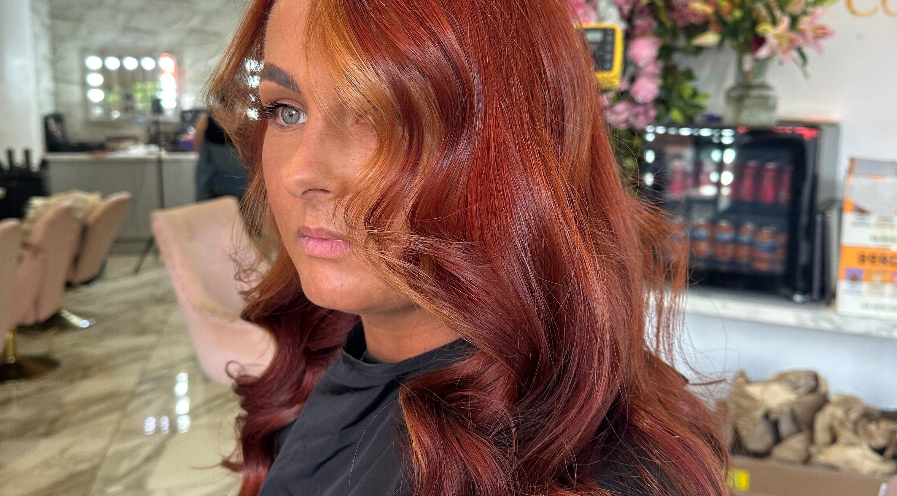 Stunning red hairstyle at Hair by Daisy, Widley, England, GB. Perfect blend of color and style.