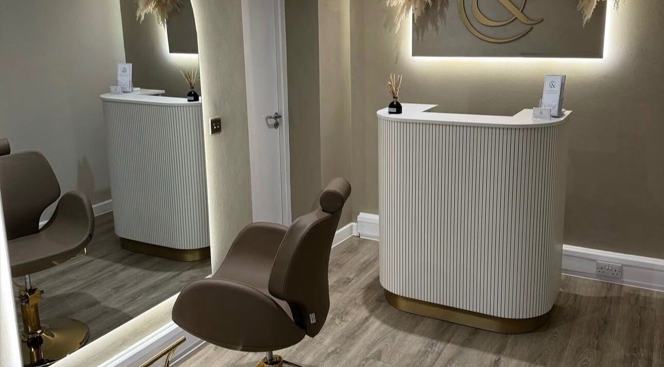 Stylish salon interior at Blushed Bykyra, Upton, England, GB featuring sleek seating and elegant decor.