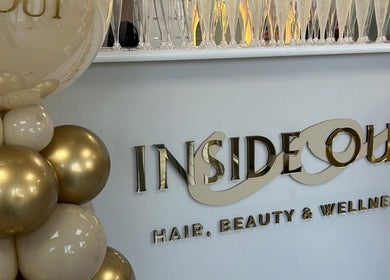 Inside Out Hair Beauty Wellness display with gold balloons in Seaham, England, GB.