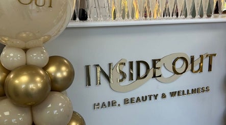 Inside Out Hair Beauty Wellness display with gold balloons in Seaham, England, GB.