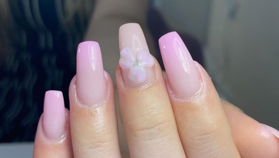 Elegant pink nails with floral design at Dream Nails by Anna, Barking, England, GB.