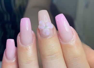 Elegant pink nails with floral design at Dream Nails by Anna, Barking, England, GB.