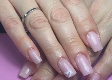 Elegant glossy pink nails design at Dream Nails by Anna, Barking, England, GB.