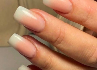 Elegant ombre nails at Dream nails by Anna in Barking, England, GB showcasing soft pink to white gradient.